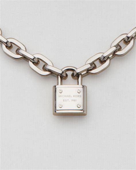 michael kors logo lock toggle necklace|Michael Kors silver necklace.